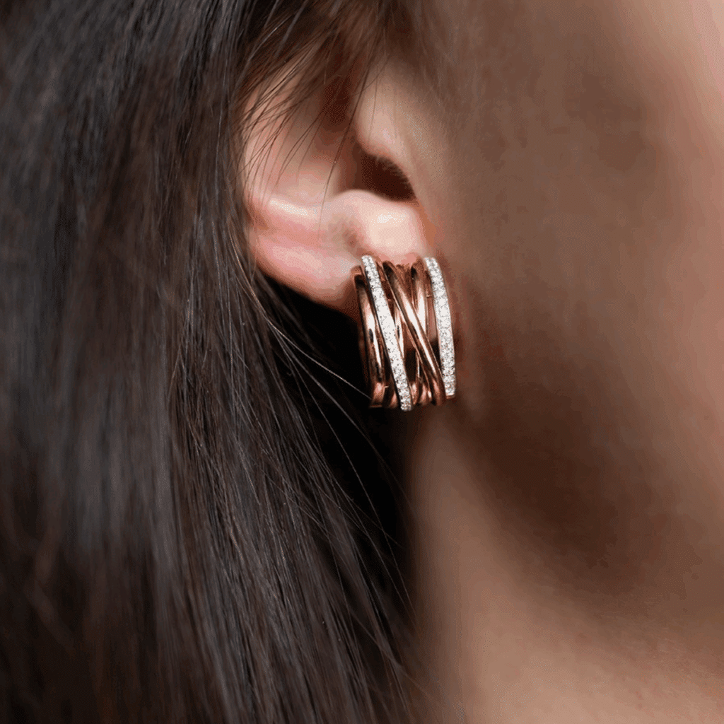 Al Coro 18 karaat rosé- en witgouden oorsieraad met diamant E1915